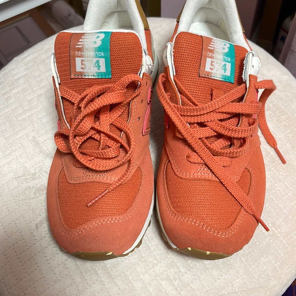 Women’s size 8.5 orange 574 New Balance Sneakers